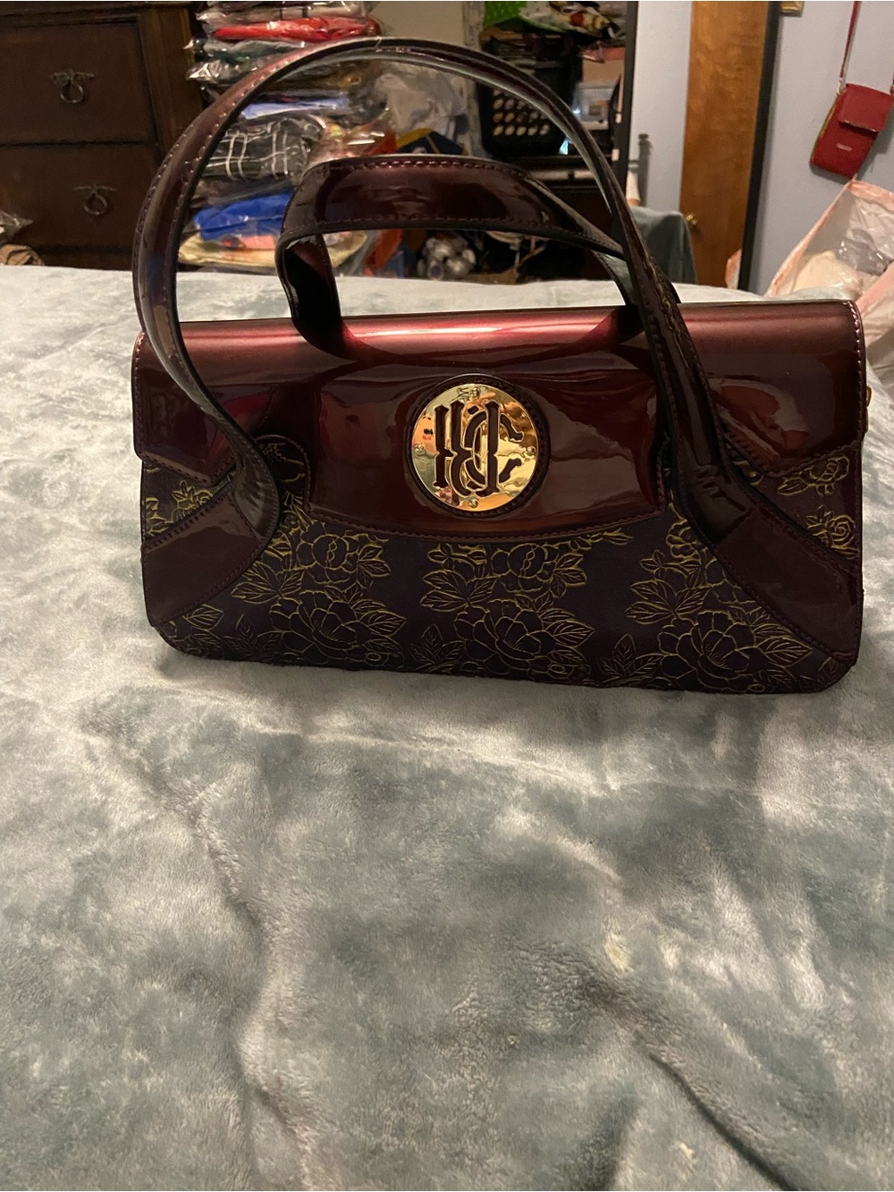 Patent Burgundy Shoulder Bag with Gold Floral Accent